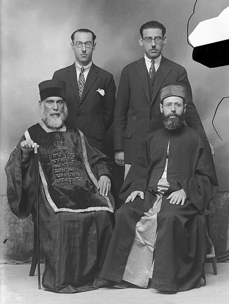 Members of the Romaniote Greek Jewish Community of Volos: Rabbi Moshe Pesach (front left) with his sons (back)