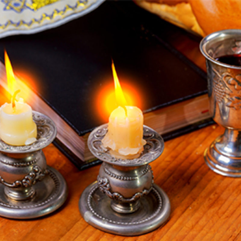 Shabbat Shalom Traditional Jewish Sabbath ritual Breaking Matzo