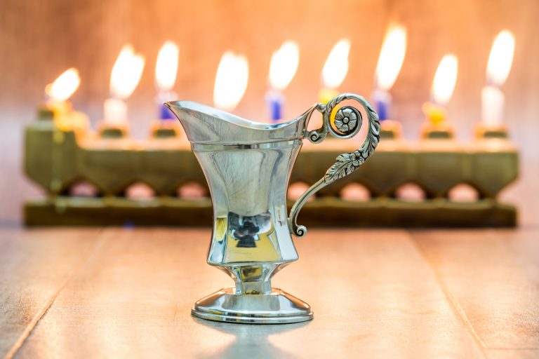 menorah with oil jug